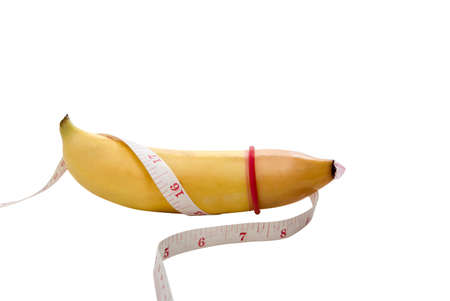 yellow banana with mesurement and condom, safety sex conceptの写真素材