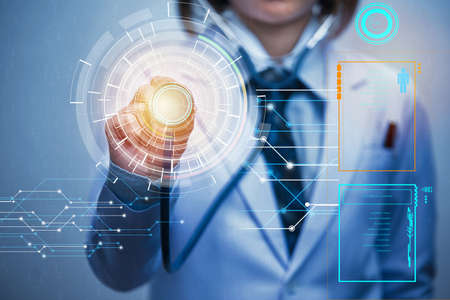 woman doctor holding blue stethoscope and show stethoscope diaphragm with white backgroundの写真素材