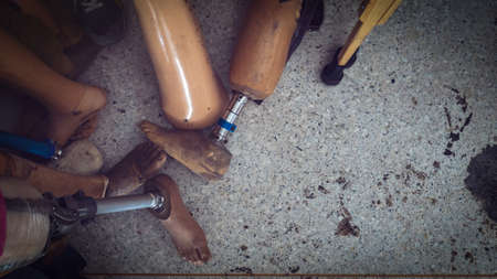 old and used leg prosthesis in stock, collection used ambulation deviceの写真素材