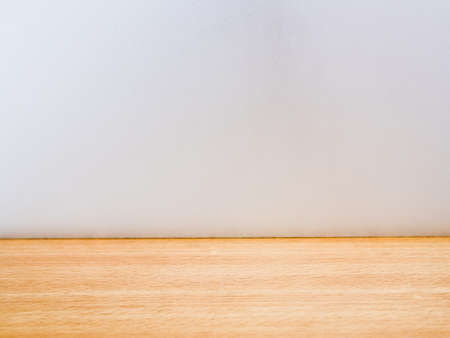 wooden floor texture with white wall and spaceの写真素材