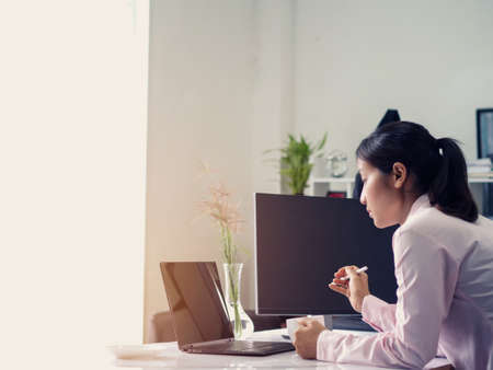 business woman trading forex stock, trading forex in tablet platform and destopの写真素材