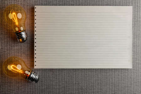 light bulb with idea and paper note with coppy space, 3d illustration renderingの写真素材