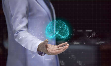 Woman doctor holding hand with holographic brain, stoke prevention concept and rehabilitation of...