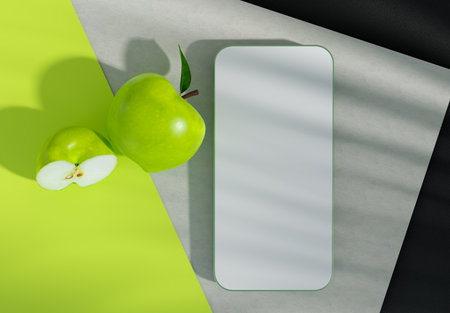 mock up smart phone screen and green apple and green backdrop, 3d illustration renderingの写真素材
