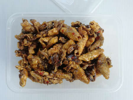 Sweet and Salty Crispy Squids in Plastic Boxの写真素材