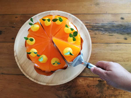 Selected Homemade Orange Cake on Cake Serverの写真素材