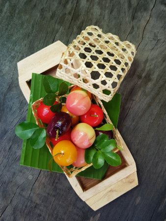 Thai Sweet Mung Bean Paste in Fruit Shape coated with Jelly, called Look Chupの写真素材