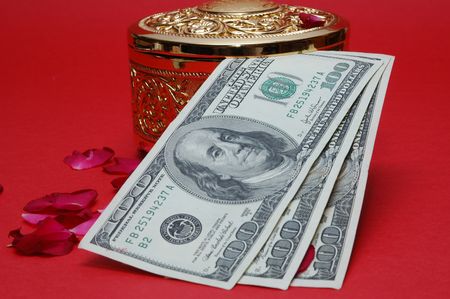 dollar note with golden boxの写真素材