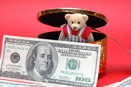 bear looking a the note, like saving account in the bankの写真素材