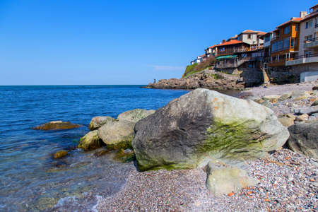 Seascape of the ancient Bulgarian town of Sozopol with rocks in the foregroundの写真素材
