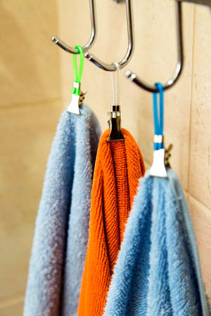 Three towels hanging on a hookの写真素材