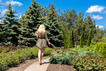 Young sexy women  walking in the parkの写真素材