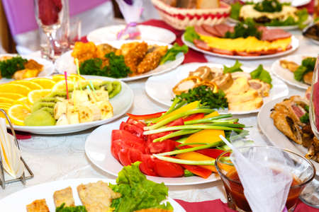 Salads and dishes on the banquet table