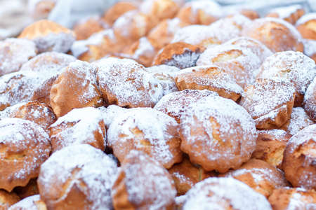 Many small sweet honey muffins. selective focus, depth of field
