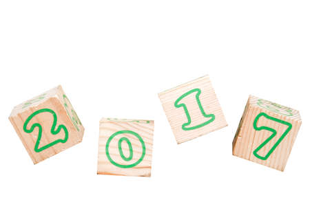 Wooden cubes with numbers 2017, isolated in white backgroundの写真素材