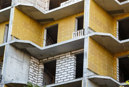 Part of house under construction with warming close upの写真素材