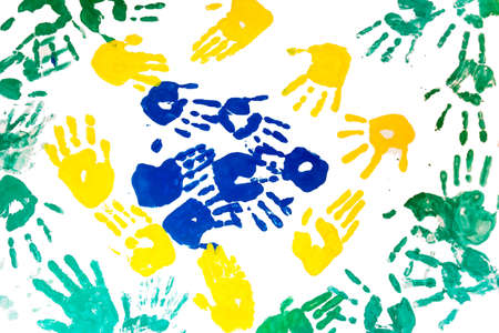 colorful childs hands prints isolated on white backgroundの写真素材