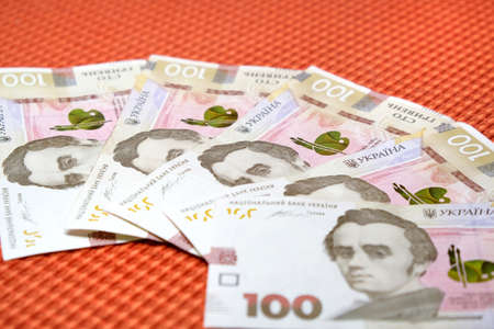 Five Hundred Hrivnas Bank Notes Ukrainian money on a fabric texture background closeup.