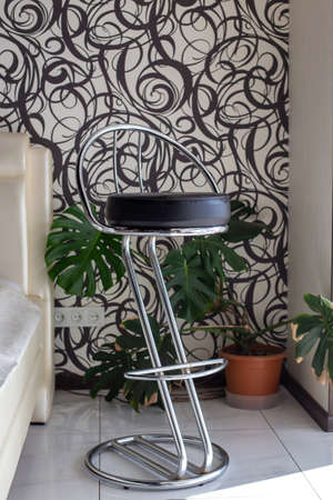 Black Leather  Modern Chair in a Bedroom.