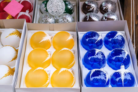 Set of Blue and Yellow Christmas Balls in a box.