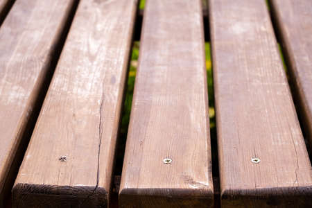 Texture of old wooden brown painted bridge floor abstract background. Depth of field.