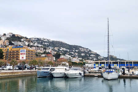 Lot of small boats in a marine port. SPAIN, PORT de ROSES - MARCH, 2022のeditorial素材