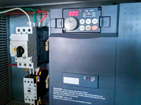 Frequency inverter, and circuit breaker in electrical cabinet of automation control system on...