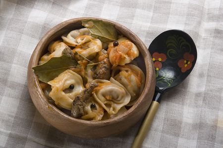 Meat dumplings in the wooden plateの写真素材