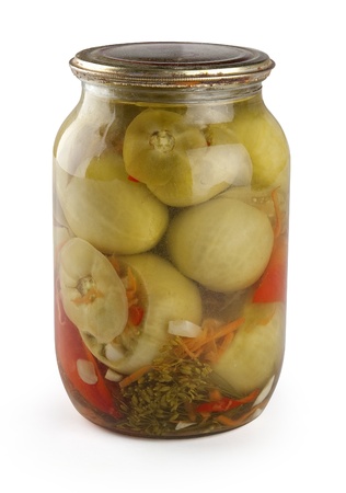 Conserved green tomato in glass jarの写真素材