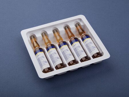 Some medicine ampules in the white plastic package