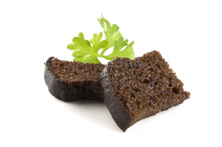 Two pieces of toasted bread with a parsleyの写真素材