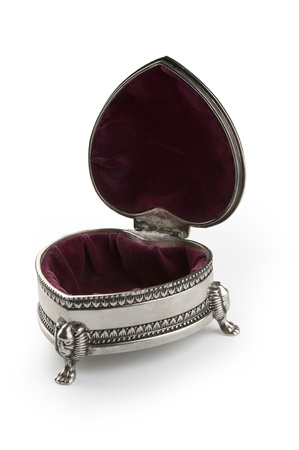 Opened metal jewel box on the white backgroundの写真素材