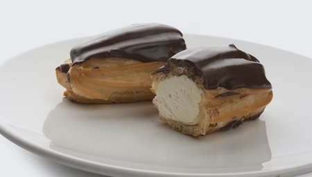 Two cream-filled French pastry on the plate