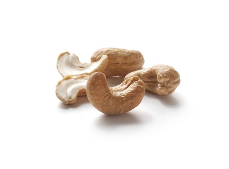 Iisolated handful of cashew nut on the white backgroundの写真素材