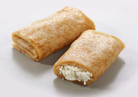 Two isolated cakes stuffed by cottage cheese の写真素材