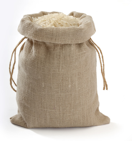 Sack with rice on the white backgroundの写真素材