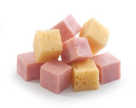 Isolated handful of ham and cheese cubes on the whiteの写真素材