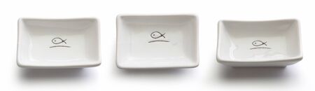 Three views of isolated white rectangular gravy boat on the white backgroundの写真素材