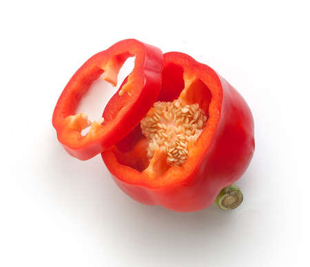 Top view of half red paprika and slice on the white backgroundの写真素材