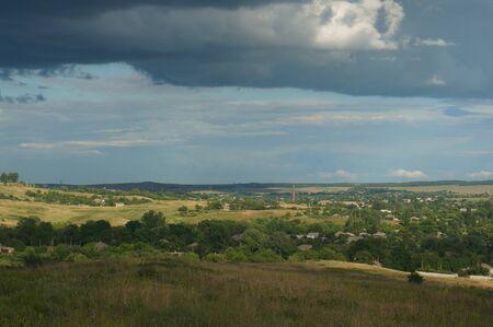 Village in the Donetsky ridge before the rainの写真素材
