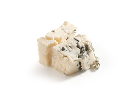 Isolated pieces of blue cheese on the whiteの写真素材