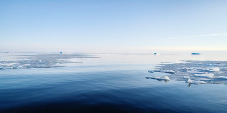 Winter sea landscape with floating ice fragments on still cold water. Generative AI.の素材