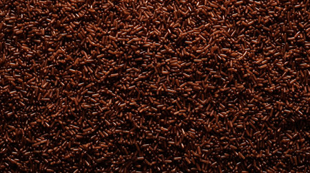 Chocolate sprinkles background. Sweet cocoa flakes. Generative AI.の素材