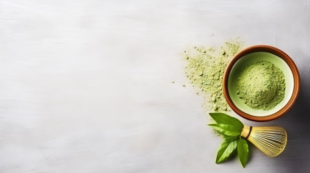 Matcha tea powder in a wooden plate on light wooden background with whisk, top view, copy space. Generative AI.の素材