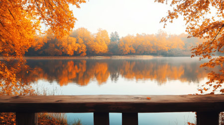 Aesthetic autumn lake surrounded by vibrant fall trees, wooden table for product placement. Generative AI.の素材