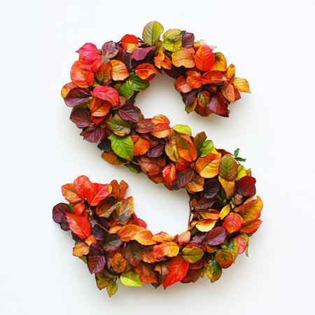 Alphabet letter S made of fall leaves, flowers. berries. Vibrant autumn colours. White clean background. Generative AI.の素材