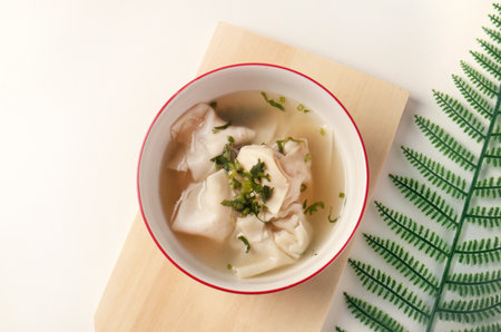 Warm Wonton Soup Fresh Herbs Top Viewの写真素材