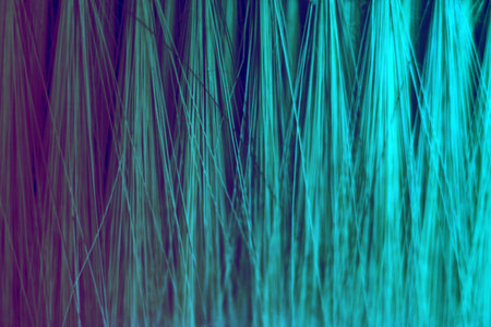 Close-Up of Abstract Blue and Purple Fiber Light Strandsの写真素材