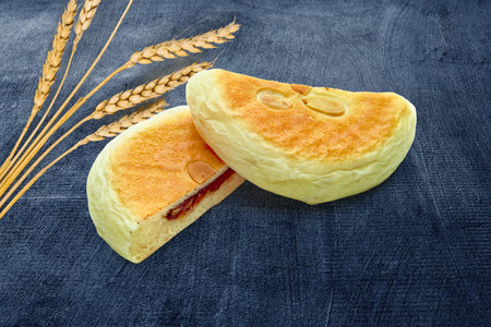 Close-Up of Freshly Baked Sweet Bread with Red Bean Filling