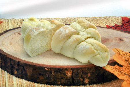 Studio Photography. Croissant Slice Arranged Opposite Each Other on White Background